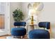 Relaxing sitting room with comfortable chairs, modern lighting, and chic decorative accents at 1380 Magnolia St, Denver, CO 80220