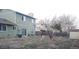 Spacious backyard featuring mature trees and fence at 9852 W 76Th Ave, Arvada, CO 80005
