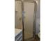 Bathroom with glass shower doors and white vanity at 9852 W 76Th Ave, Arvada, CO 80005