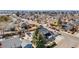 Overhead view of the home, with a spacious yard and surrounded by a vibrant neighborhood at 4620 Blackhawk Way, Denver, CO 80239