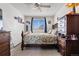 Comfortable bedroom featuring a ceiling fan and a sunny window with nice window coverings at 4620 Blackhawk Way, Denver, CO 80239
