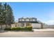 Charming two-story home with brick and siding, a well-manicured lawn, and an attached two-car garage at 4620 Blackhawk Way, Denver, CO 80239