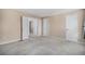 Large bedroom with three separate doorways for easy access to other parts of the house at 19962 E Kent Dr, Aurora, CO 80013