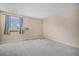 Neutral bedroom with window overlooking the neighborhood at 19962 E Kent Dr, Aurora, CO 80013