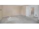 Carpeted bedroom with closet and ensuite access through a doorway at 19962 E Kent Dr, Aurora, CO 80013
