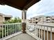 View from balcony with white railing overlooking community at 7440 S Blackhawk St # 208, Englewood, CO 80112