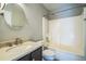 Cozy bathroom with a vanity, sink, toilet, and bathtub-shower combination at 2446 S Gibralter Way, Aurora, CO 80013