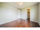 Cozy bedroom with hardwood floors, ceiling fan, walk-in closet providing a comfortable retreat at 2446 S Gibralter Way, Aurora, CO 80013