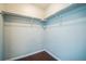 Walk-in closet with shelving for ample storage and organization at 2446 S Gibralter Way, Aurora, CO 80013