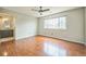Main bedroom features hardwood floors and an en-suite bathroom providing ultimate comfort and privacy at 2446 S Gibralter Way, Aurora, CO 80013