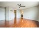 Spacious main bedroom with hardwood floors, connecting bath, and walk-in closet at 2446 S Gibralter Way, Aurora, CO 80013