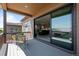 Relaxing outdoor deck area with seating, providing a seamless transition to indoor living and kitchen at 11136 Sweet Cicely Dr, Parker, CO 80134