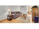 Welcoming living room features a floral sofa, a wooden coffee table and hardwood floors at 8468 Chase Dr, Arvada, CO 80003