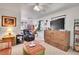 Relaxing living space with a murphy bed, comfortable seating, and ample natural light, perfect for unwinding at 8468 Chase Dr, Arvada, CO 80003