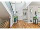 Spacious foyer with a modern staircase, artwork, and stylish decor at 4274 E Dickenson Pl, Denver, CO 80222