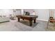 Entertainment ready basement game room with billiard table and lounge area at 4274 E Dickenson Pl, Denver, CO 80222