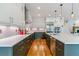 Contemporary kitchen features stainless appliances, sleek cabinetry, and ample counter space at 4274 E Dickenson Pl, Denver, CO 80222