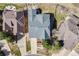Aerial view shows the house and neighboring properties at 1975 Wild Star Way, Castle Rock, CO 80104
