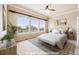 Virtually staged bedroom featuring a serene atmosphere, natural light and neutral decor at 1975 Wild Star Way, Castle Rock, CO 80104