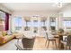 Bright, virtually staged living area with modern furnishings and scenic views at 1975 Wild Star Way, Castle Rock, CO 80104
