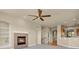 Bright living room with fireplace, carpet floors, and hardwood floors at 1975 Wild Star Way, Castle Rock, CO 80104