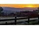 Scenic mountain view at sunset, showcasing the serene landscape and natural beauty of the property's surroundings at 1975 Wild Star Way, Castle Rock, CO 80104