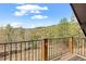 A beautiful balcony view of the forest at 13609 Elsie Rd, Conifer, CO 80433
