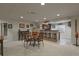 Spacious basement including dining table with chairs, bar area, recessed lighting, and neutral color scheme at 11839 Saddleback Ct, Parker, CO 80138