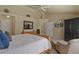 Spacious bedroom featuring neutral colors, cozy sitting area, and walk-in closet at 11839 Saddleback Ct, Parker, CO 80138
