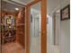 Home wine cellar featuring a tiled floor, wine racks, and lighting, providing an elegant space for wine storage at 11839 Saddleback Ct, Parker, CO 80138