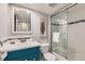 Modern bathroom with a sleek vanity, stylish tile accents, and a glass-enclosed shower at 1008 N Corona St # 205, Denver, CO 80218