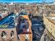 Open rooftop deck featuring tables and chairs, with city views at 1008 N Corona St # 205, Denver, CO 80218