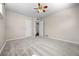 Spacious bedroom with large closets and neutral carpet at 707 Uvalda St, Aurora, CO 80011