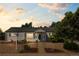 Charming single-story home with manicured front yard and inviting entrance walkway at 707 Uvalda St, Aurora, CO 80011