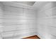 Walk-in closet with wire shelving and hardwood floor at 707 Uvalda St, Aurora, CO 80011