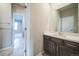 Bathroom with a single vanity and tiled floor at 14221 Ivanhoe St, Thornton, CO 80602