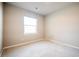Comfortable bedroom bathed in natural light from a window at 14221 Ivanhoe St, Thornton, CO 80602