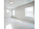A sun-filled bedroom with lots of natural light from multiple windows at 14221 Ivanhoe St, Thornton, CO 80602