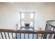 Bright, open living area featuring a fireplace, high ceilings and modern lighting fixture at 14221 Ivanhoe St, Thornton, CO 80602