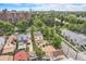 Aerial view of the neighborhood showing surrounding buildings and mature trees at 7 Elati St, Denver, CO 80223
