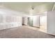 Spacious basement featuring carpet, light walls, and a partial bathroom at 7 Elati St, Denver, CO 80223