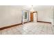 Dining room featuring tiled floor, natural light, and a modern chandelier at 7 Elati St, Denver, CO 80223