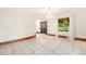 Living room features a chandelier, and large windows with natural light at 7 Elati St, Denver, CO 80223