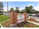 A red brick welcome sign for Wellshire Golf Course & Event Center in Denver at 2975 S Jackson St, Denver, CO 80210