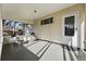 Enclosed porch with comfortable seating and natural light creates a welcoming atmosphere at 2975 S Jackson St, Denver, CO 80210