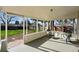 Enclosed sunroom offers tranquil views of the backyard and garden at 2975 S Jackson St, Denver, CO 80210