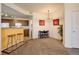 Bright dining area with an open view of the kitchen and bar seating at 5723 N Gibralter Way # 205, Aurora, CO 80019
