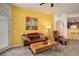 Cozy living room with a comfortable leather sofa and a stylish coffee table, perfect for relaxation at 5723 N Gibralter Way # 205, Aurora, CO 80019