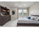 Cozy bedroom with carpet, modern decor, and natural light at 9552 E Caley Cir, Englewood, CO 80111