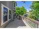 Well-maintained wooden deck featuring an outdoor grill, ideal for backyard gatherings at 9552 E Caley Cir, Englewood, CO 80111